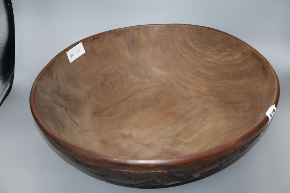An African carved wood bowl, diameter 43cm